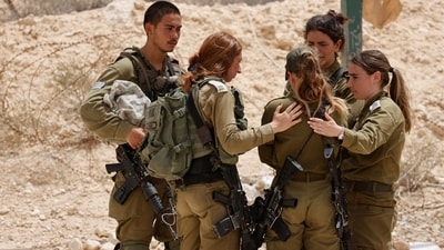 Soldiers react near the site of a reported security incident near Israel's southern border with Egypt, Israel June 3. (REUTERS)