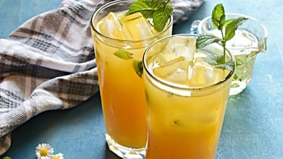 Mango Coconut Water: Combine fresh mango puree, coconut water, a squeeze of lime juice, and a pinch of salt. Shake or stir well, and serve over ice for a hydrating tropical delight. (Pexels) Mango Coconut Water: Combine fresh mango puree, coconut water, a squeeze of lime juice, and a pinch of salt. Shake or stir well, and serve over ice for a hydrating tropical delight. (Pexels)