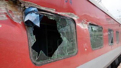 Shattered windows of the Yeshwantpur-Howrah Express. (ANI) Shattered windows of the Yeshwantpur-Howrah Express. (ANI)