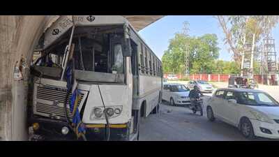 The bus that crashed into a pillar near PAU gate number 1 on Ludhiana-Ferozepur Road on Saturday. (HT Photo)