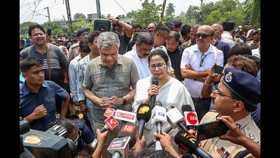 West Bengal chief minister Mamata Banerjee at the accident scene with railway minister Ashwini Vaishnaw. (PTI) West Bengal chief minister Mamata Banerjee at the accident scene with railway minister Ashwini Vaishnaw. (PTI)