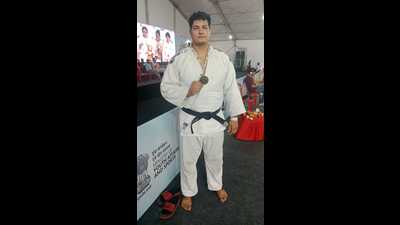 Yash Ghangas of Chaudhary Bansi Lal University who won the Gold in the +100 Kg Judo. (HT Photo) Yash Ghangas of Chaudhary Bansi Lal University who won the Gold in the +100 Kg Judo. (HT Photo)