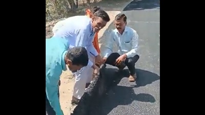 The men in the video were observed expressing their disappointment with the newly constructed road. (Twitter/@MdFujailAhmed)