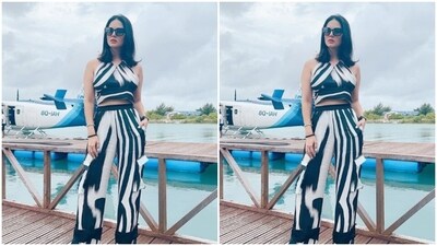 Styled by fashion stylist Hitendra Kapopara, Sunny wore her tresses open in straight locks with a middle part and decked up in contoured cheeks and a shade of nude lipstick.&nbsp; (Instagram/@sunnyleone)