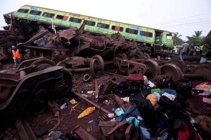 Belongings of passengers lie next to a damaged coach after the deadly collision. (REUTERS)