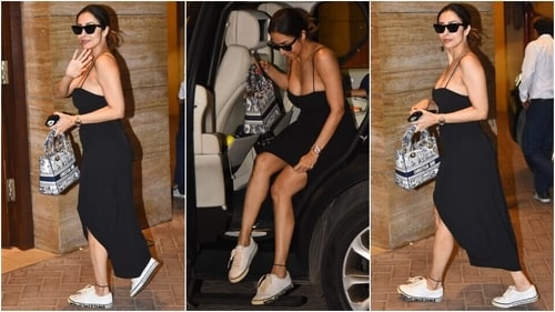 Malaika Arora stuns in a black midi dress for an outing. (HT Photo/Varinder Chawla) Malaika Arora stuns in a black midi dress for an outing. (HT Photo/Varinder Chawla)