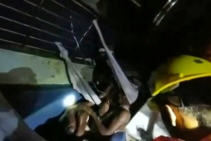 This frame grab taken from video footage provided by India's National Disaster Response Force and made available via AFPTV on June 3, 2023 shows emergency workers rescuing a trapped man from the horrific three-train collision. (AFP) This frame grab taken from video footage provided by India's National Disaster Response Force and made available via AFPTV on June 3, 2023 shows emergency workers rescuing a trapped man from the horrific three-train collision. (AFP)