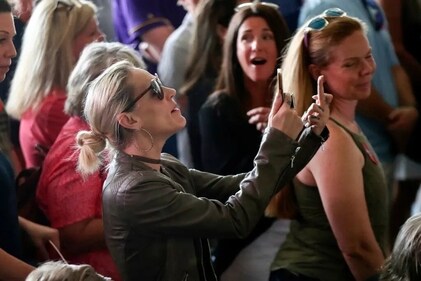 A female protestor interrupts Florida Governor Ron DeSantis. (Image Credit: AP/New York Post) (AP) A female protestor interrupts Florida Governor Ron DeSantis. (Image Credit: AP/New York Post) (AP)