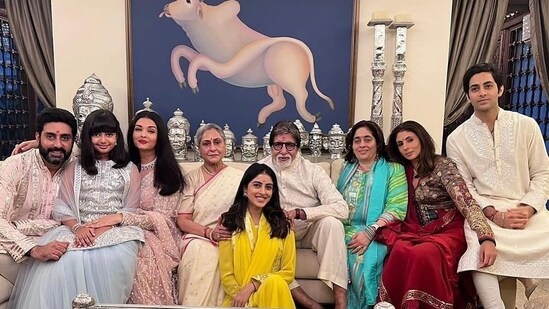 One with the brood: Amitabh Bachchan and Jaya Bachchan sit for a family photo with son Abhishek Bachchan, his wife Aishwarya Rai and daughter Aaradhya Bachchan, and daughter Shweta Nanda, her kids Navya Naveli Nanda and Agastya Nanda. Her husband Nikhil Nanda is not seen but her sister-in-law Natasha Nanda is seen in blue.&nbsp;