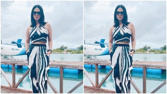 Sunny played muse to fashion designer house The Missy Co and picked a blue co-ord set for the pictures. The actor decked up in a monochrome cropped top with halter neckline and teamed it with a pair of matching trousers with wide legs.&nbsp;(Instagram/@sunnyleone)