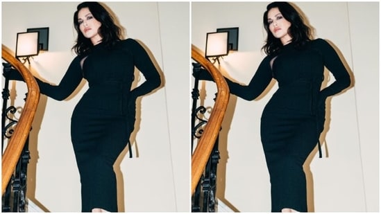 Sunny decked up in a long black dress with full sleeves, closed neckline and belt details at the waist. The dress came with see-through mesh details in the neckline.&nbsp;(Instagram/@sunnyleone)