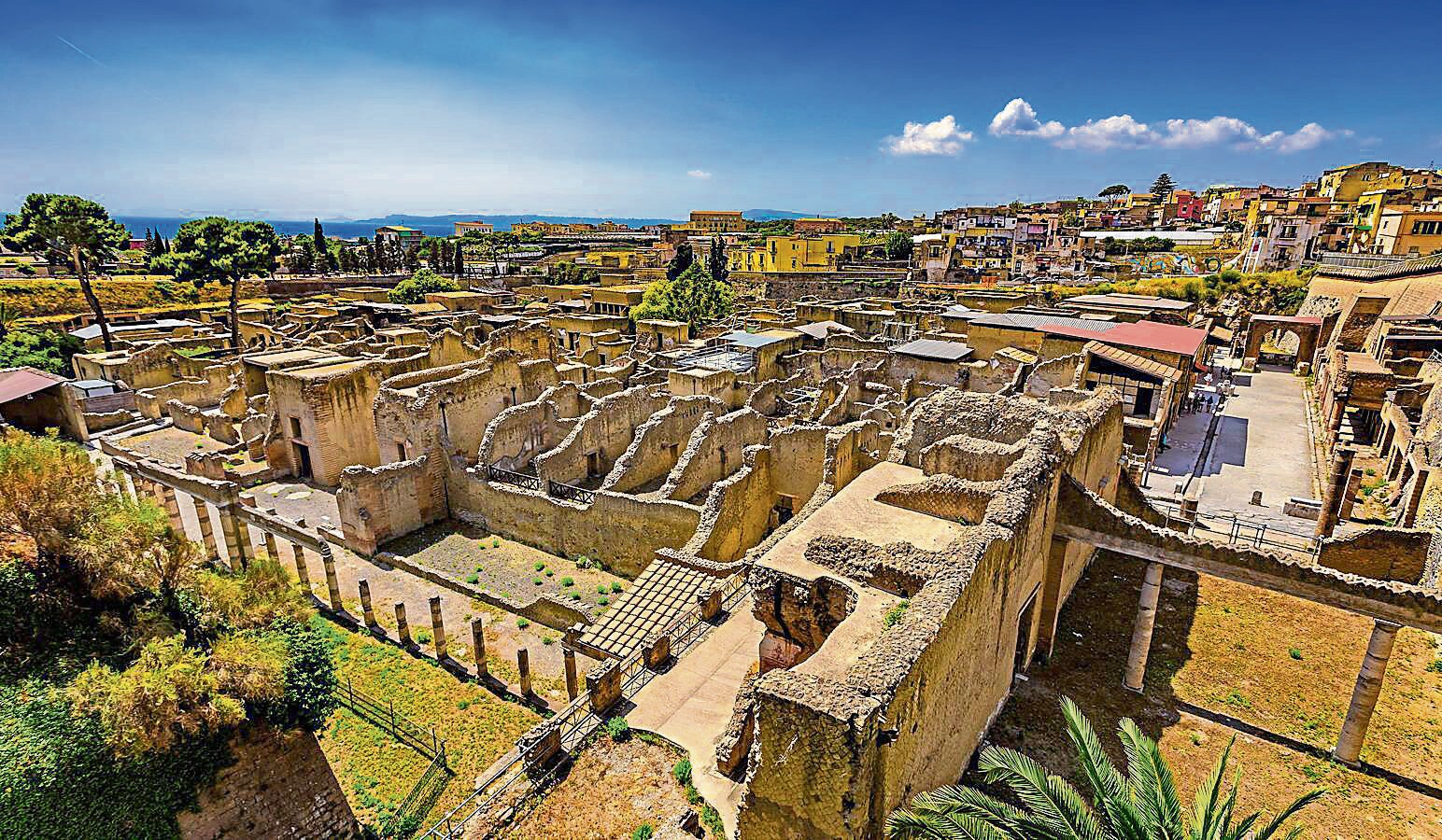 The ruins of the Roman city of Herculaneum, near present-day Naples. The scrolls and fragments were found in an underground library. (Adobe Stock)