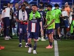 Paris Saint-Germain's Argentine forward Lionel Messi walks off the winners stand during the 2022-2023 Ligue 1 championship trophy ceremony Paris Saint-Germain's Argentine forward Lionel Messi walks off the winners stand during the 2022-2023 Ligue 1 championship trophy ceremony