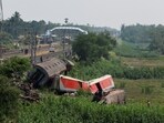A view shows damaged coaches at the site of a train collision following the accident in Balasore district in Odisha.