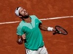 Russia's Karen Khachanov celebrates winning his fourth round match against Italy's Lorenzo Sonego 