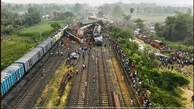 A rescue and search operation being conducted at the accident site in Odisha’s Balasore district, on Saturday. (PTI) A rescue and search operation being conducted at the accident site in Odisha’s Balasore district, on Saturday. (PTI)
