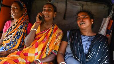 Families of the Odisha train accident victims, in Balasore district on Sunday. (AFP) Families of the Odisha train accident victims, in Balasore district on Sunday. (AFP)