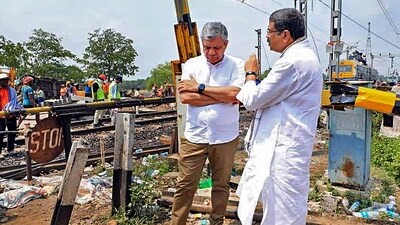 Railways Minister Ashwini Vaishnaw with Union Minister Dharmendra Pradhan at the site of the accident involving three trains. (PTI) Railways Minister Ashwini Vaishnaw with Union Minister Dharmendra Pradhan at the site of the accident involving three trains. (PTI)