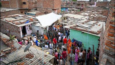 People gathered at the residence of the 16-year-old girl, who was stabbed to death at Shahbad Dairy in New Delhi. (Sanchit Khanna/HT Photo) People gathered at the residence of the 16-year-old girl, who was stabbed to death at Shahbad Dairy in New Delhi. (Sanchit Khanna/HT Photo)