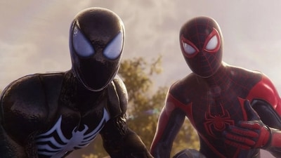 Peter Parker in Venom suit (Left) and Miles Morales. (Image Credit: Insomniac Games) Peter Parker in Venom suit (Left) and Miles Morales. (Image Credit: Insomniac Games)