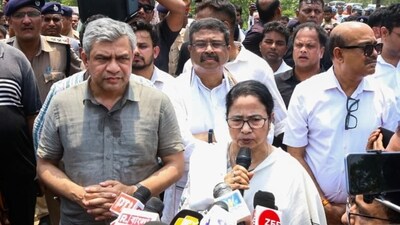West Bengal Chief Minister Mamata Banerjee talks to the media after visiting the site of the accident involving Coromandel Express, Bengaluru-Howrah Express and a goods train , in Balasore district. Railways Minister Ashwini Vaishnaw and Union minister Dharmendra Pradhan are also seen. (PTI)