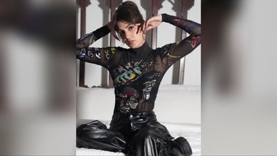 Her top features quirky multicoloured sequin designs, boasts sheer fabric, full sleeves, and a high neck. Paired with sleek leather pants, her outfit exudes a unique blend of edginess and glamour. (Instagram/@rhea_chakraborty) Her top features quirky multicoloured sequin designs, boasts sheer fabric, full sleeves, and a high neck. Paired with sleek leather pants, her outfit exudes a unique blend of edginess and glamour. (Instagram/@rhea_chakraborty)
