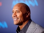 Actor Dwayne Johnson poses at the world premiere of Walt Disney Animation Studios' 'Moana'.