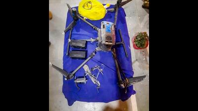 A Pakistan drone and heroin seized by BSF personnel near the border in Amritsar on Monday. (PTI)