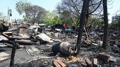 Gurugram, India-June 05, 2023: A view of burnt shanties seen after a fire broke out in a slum area in sector-29 near Appu Ghar water park, in Gurugram, India, on Monday, 05 June 2023. (Photo by Parveen Kumar/Hindustan Times)**To go with Debashish Karmakar's story Gurugram, India-June 05, 2023: A view of burnt shanties seen after a fire broke out in a slum area in sector-29 near Appu Ghar water park, in Gurugram, India, on Monday, 05 June 2023. (Photo by Parveen Kumar/Hindustan Times)**To go with Debashish Karmakar's story