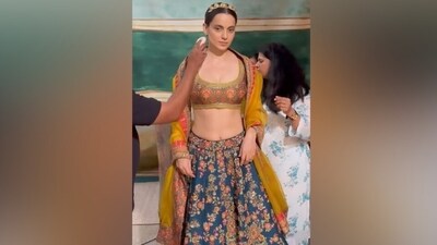 Kangana draped a sheer dupatta on her shoulders to complete the ensemble. It features embroidered broad gota patti borders. Lastly, the star accessorised the ethnic look with just a gold Saggi Phul or a headdress adorned in colourful beads. (Instagram) Kangana draped a sheer dupatta on her shoulders to complete the ensemble. It features embroidered broad gota patti borders. Lastly, the star accessorised the ethnic look with just a gold Saggi Phul or a headdress adorned in colourful beads. (Instagram)
