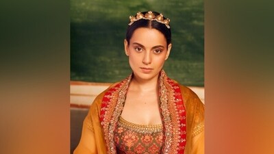 Kangana draped a sheer dupatta on her shoulders to complete the ensemble. It features embroidered broad gota patti borders. Lastly, the star accessorised the ethnic look with just a gold Saggi Phul or a headdress adorned in colourful beads. (Instagram) Kangana draped a sheer dupatta on her shoulders to complete the ensemble. It features embroidered broad gota patti borders. Lastly, the star accessorised the ethnic look with just a gold Saggi Phul or a headdress adorned in colourful beads. (Instagram)