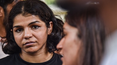 Wrestlers Sakshi Malik and Vinesh Phogat address the media during their protest against WFI chief Brij Bhushan Sharan Singh on May 20. (PTI Photo) Wrestlers Sakshi Malik and Vinesh Phogat address the media during their protest against WFI chief Brij Bhushan Sharan Singh on May 20. (PTI Photo)