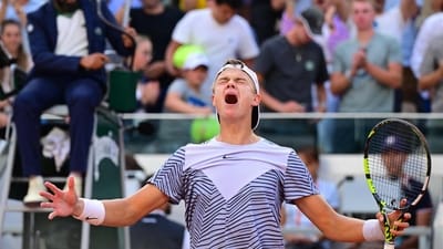 Denmark's Holger Rune celebrates his victory over Argentina's Francisco Cerundolo during their men's singles match on day nine of the Roland-Garros (AFP)