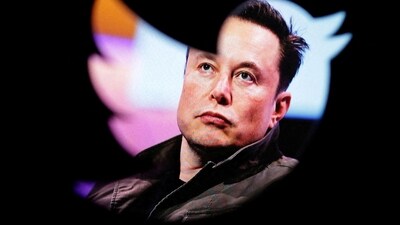 FILE PHOTO: Elon Musk's photo is seen through a Twitter logo in this illustration taken October 28, 2022. (Reuters)