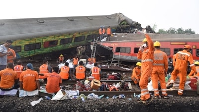 NDRF personnel during a rescue operation after three trains collided with each other resulting in a major accident in Odisha's Balasore district on Saturday. (Photo by Arabinda Mahapatra) NDRF personnel during a rescue operation after three trains collided with each other resulting in a major accident in Odisha's Balasore district on Saturday. (Photo by Arabinda Mahapatra)