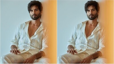 Just a day ago, Shahid Kapoor rocked a stylish white ensemble consisting of a cotton shirt adorned with vertical line detailing and fake pockets. He effortlessly paired it with matching straight-fit pants. (Instagram/@shahidkapoor) Just a day ago, Shahid Kapoor rocked a stylish white ensemble consisting of a cotton shirt adorned with vertical line detailing and fake pockets. He effortlessly paired it with matching straight-fit pants. (Instagram/@shahidkapoor)