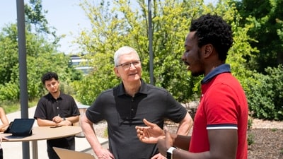 Apple chief executive officer Tim Cook interacts with students ahead of WWDC 2023. (Twitter/Tim Cook)