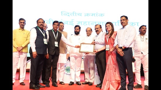 Navi Mumbai Municipal Corporation Commissioner Rajesh Narvekar receiving the award from Chief Minister Eknath Shinde on Monday. (HT PHOTO)