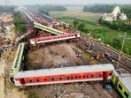A drone view shows derailed coaches after two passenger trains collided in Odisha's Balasore district on June 3.