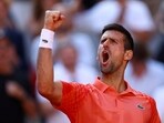 Serbia's Novak Djokovic celebrates winning his quarter final match against Russia's Karen Khachanov