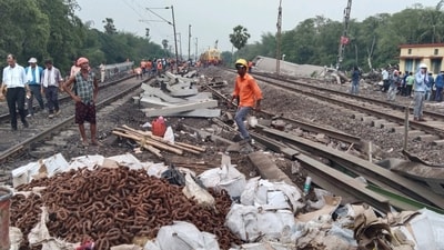 Balasore, India- June 05, 2023: Railway maintenance teams clearing the railway tracks after the debris of the trains were scattered all around due to the accident in between Coromandel express, a Goods train and Yashavantpur Howrah Express at Bahanaga railway Station in Baleswar district in Odisha on Monday, June 05 2023. (Photo by Arabinda Mahapatra/ Hindustan Times) Balasore, India- June 05, 2023: Railway maintenance teams clearing the railway tracks after the debris of the trains were scattered all around due to the accident in between Coromandel express, a Goods train and Yashavantpur Howrah Express at Bahanaga railway Station in Baleswar district in Odisha on Monday, June 05 2023. (Photo by Arabinda Mahapatra/ Hindustan Times)