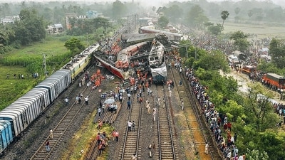 A rescue and search operation being conducted at the accident site in Odisha’s Balasore district, on Saturday. (PTI) A rescue and search operation being conducted at the accident site in Odisha’s Balasore district, on Saturday. (PTI)