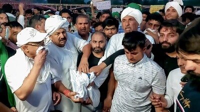 Bhartiya Kisan Union (BKU) president Naresh Tikait, rushed to Haridwar where wrestlers Sakshi Malik, Bajrang Punia, Vinesh Phogat and others had gathered to immerse their medals and persuaded them to not do so (ANI) Bhartiya Kisan Union (BKU) president Naresh Tikait, rushed to Haridwar where wrestlers Sakshi Malik, Bajrang Punia, Vinesh Phogat and others had gathered to immerse their medals and persuaded them to not do so (ANI)