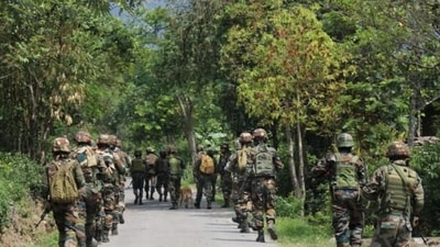 Army, Assam Rifles, CAPF & police personnel during their 'Extensive Area Domination Operations' to restore peace in violence-hit areas of Manipur. (PTI File Photo) Army, Assam Rifles, CAPF & police personnel during their 'Extensive Area Domination Operations' to restore peace in violence-hit areas of Manipur. (PTI File Photo)