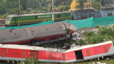 Balasore: A train runs past derailed coaches after train services resumed on the section where the accident happened on Friday, near Bahanga Bazar railway station in Balasore district on Tuesday (PTI) Balasore: A train runs past derailed coaches after train services resumed on the section where the accident happened on Friday, near Bahanga Bazar railway station in Balasore district on Tuesday (PTI)