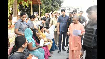 CM Yogi Adityanath at the Janta Darbar at the Digvijaya Nath Auditorium of the Gorakhnath Temple on Tuesday (HT Photo)