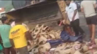 People were seen rushing to the accident site and grabbing the beer bottles lying on the road. (Twitter/PTI)