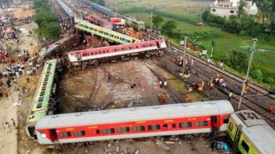 A drone view shows derailed coaches after two passenger trains collided in Odisha's Balasore district on June 3. (Reuters)