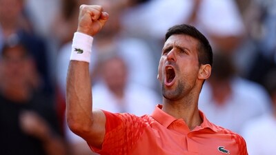 Serbia's Novak Djokovic celebrates winning his quarter final match against Russia's Karen Khachanov (REUTERS)