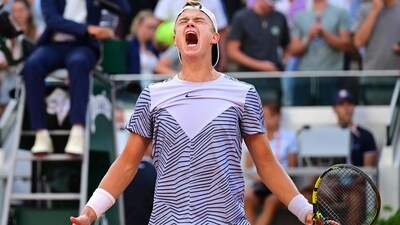Holger Rune celebrates his victory over Francisco Cerundolo during their men's singles match (AFP)